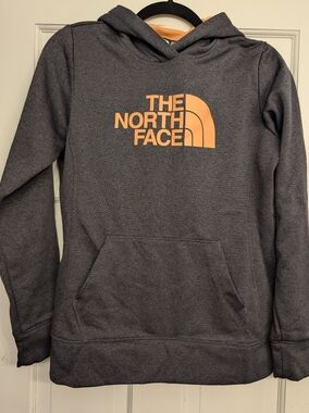 The North Face Women's’s Charcoal Gray Hoodie with Orange Logo